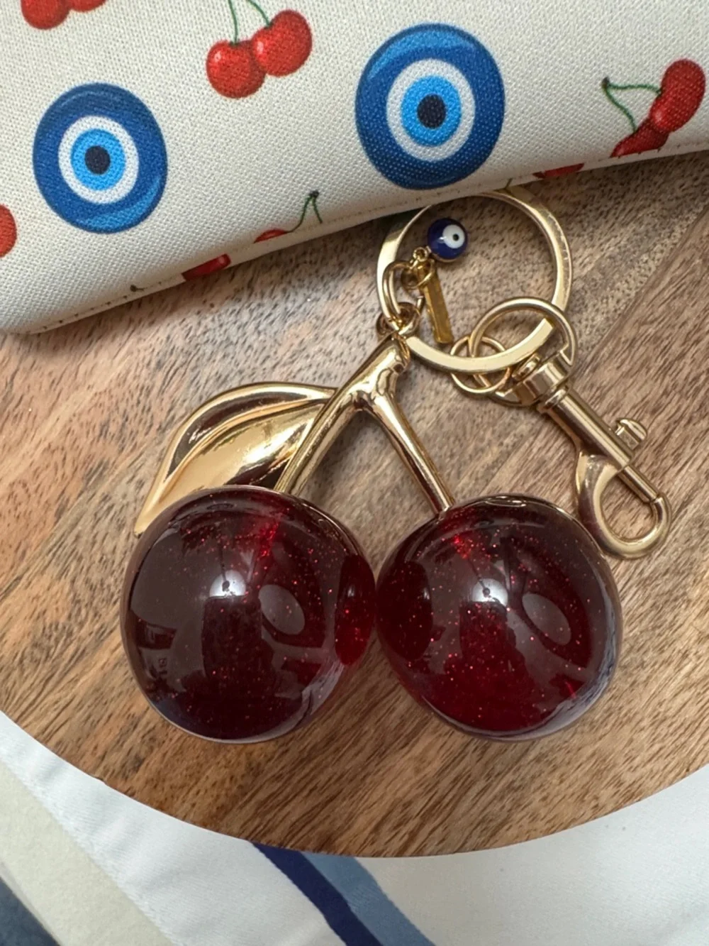 Fashionably Protected Cherry & Evil Eye Wristlet Pouch – Cream - Picture 9 of 9